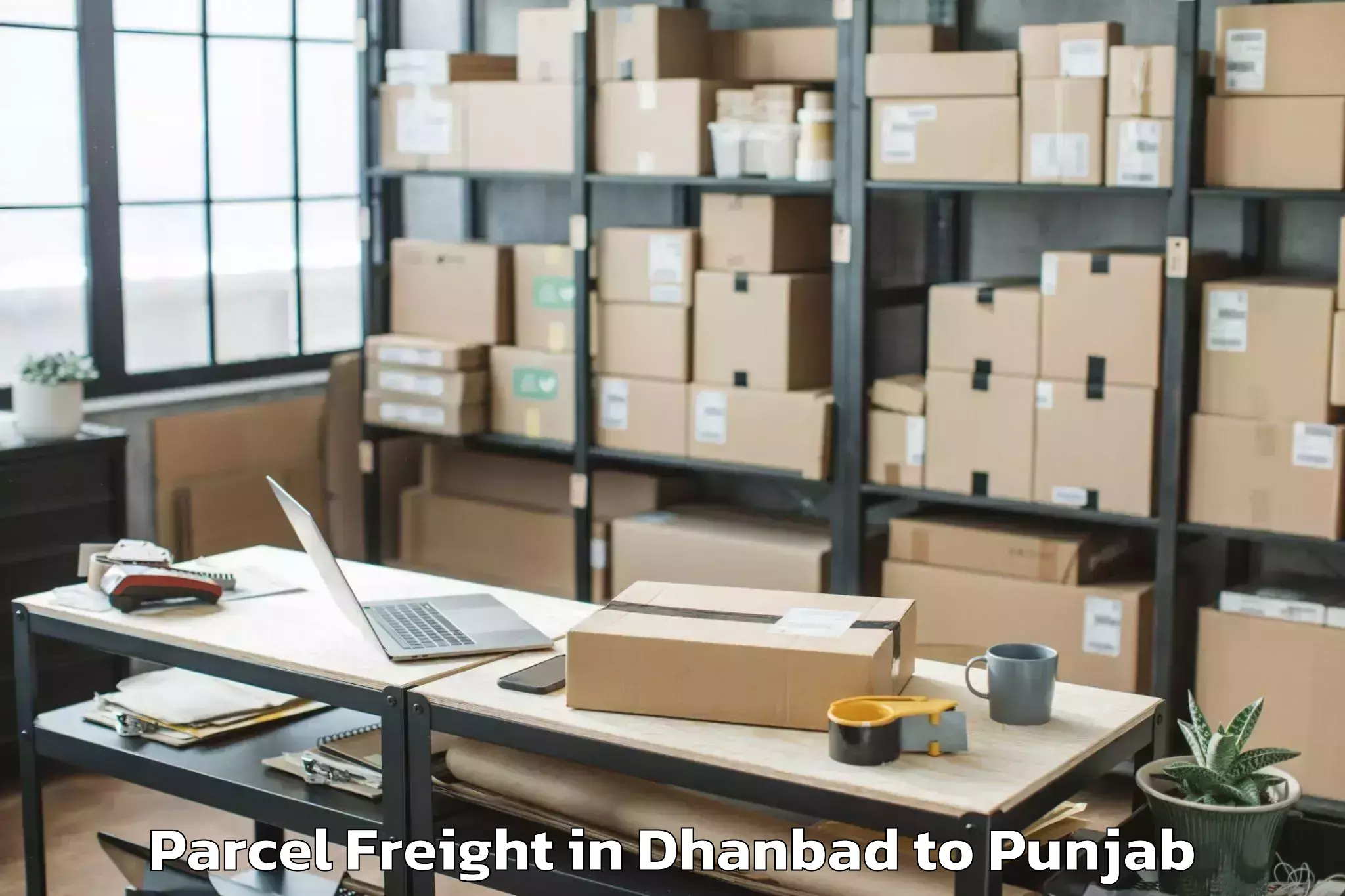 Book Dhanbad to Nurpur Kalan Parcel Freight